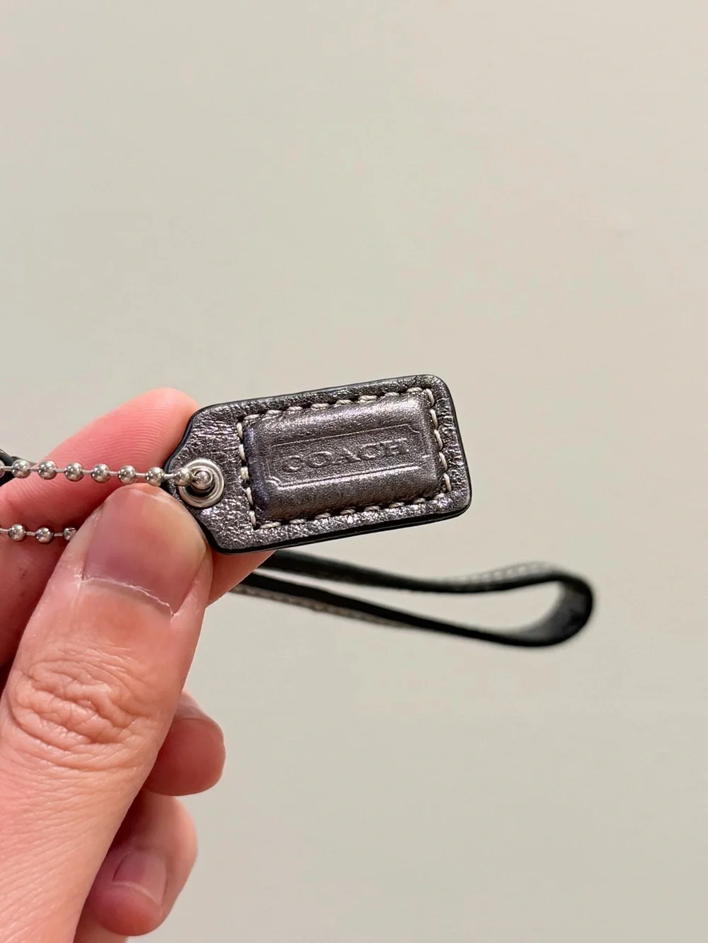 Coach Vintage Metallic Embossed Leather Wristlet